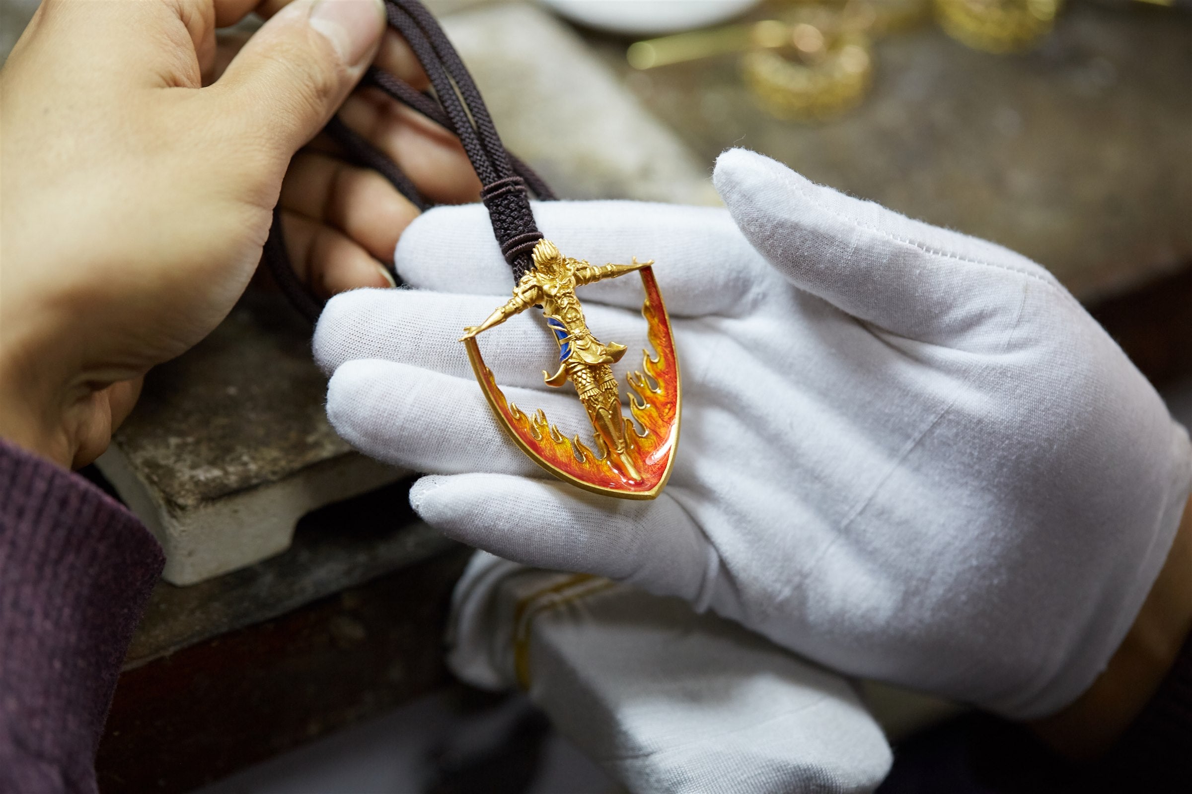 Finished Garuda pendant presented after hand-finishing